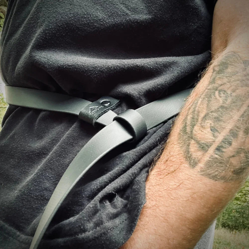 Biothane dog lead worn around waist, showing hands-free use and durable material