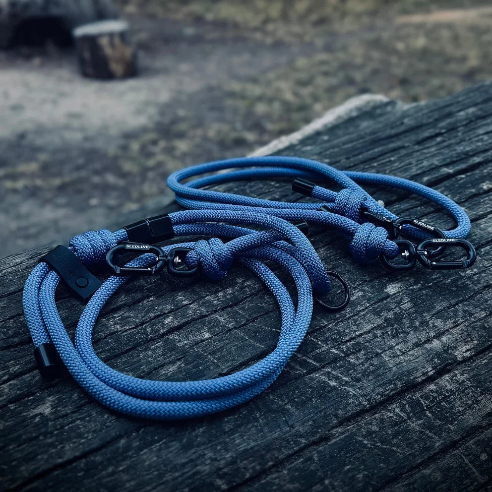 Blue rPET rope dog leads with strength tested hardware on wood surface outdoors