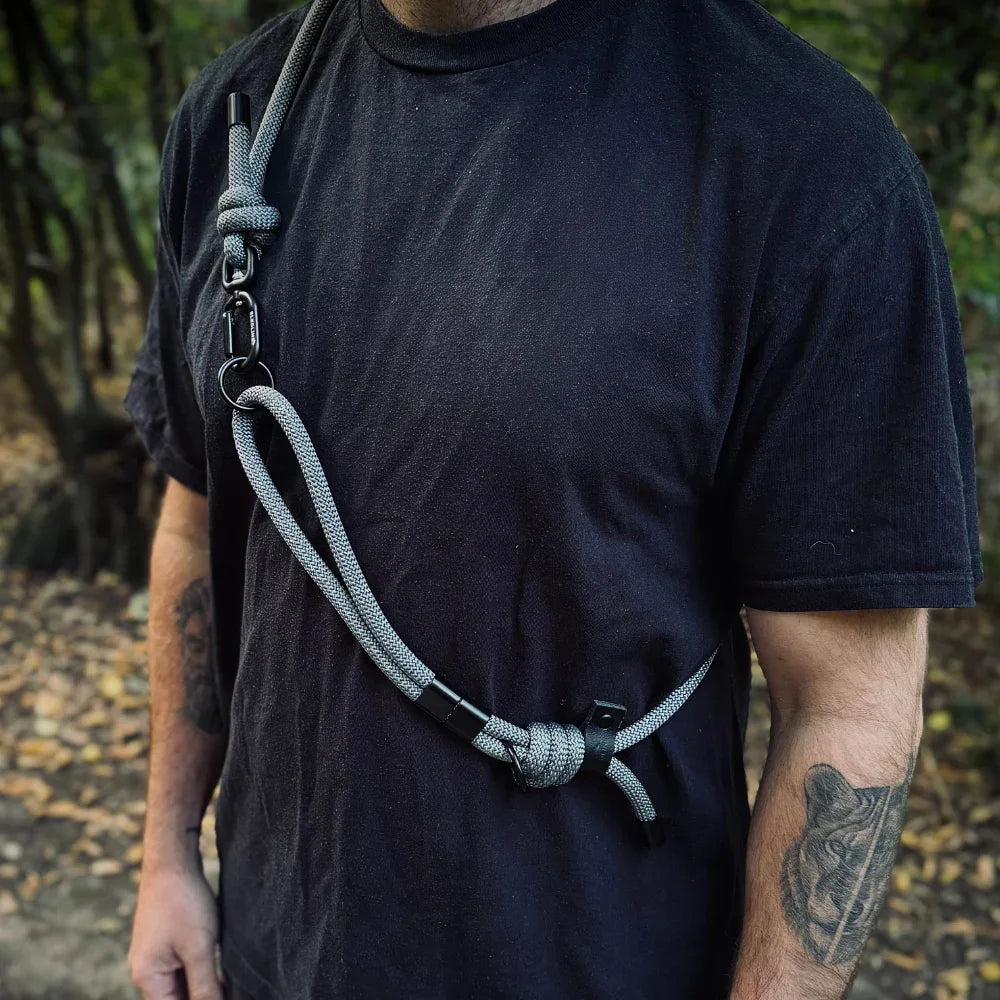 Man wearing handmade rPET rope dog lead with strength tested hardware outdoors
