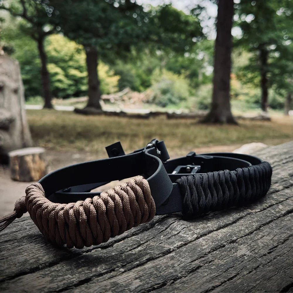 Handmade dog collars with rPET rope and Biothane on wood in outdoor forest setting