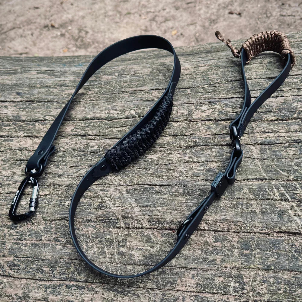 Handmade Biothane and rPET dog lead with carabiner and strength tested hardware on wood