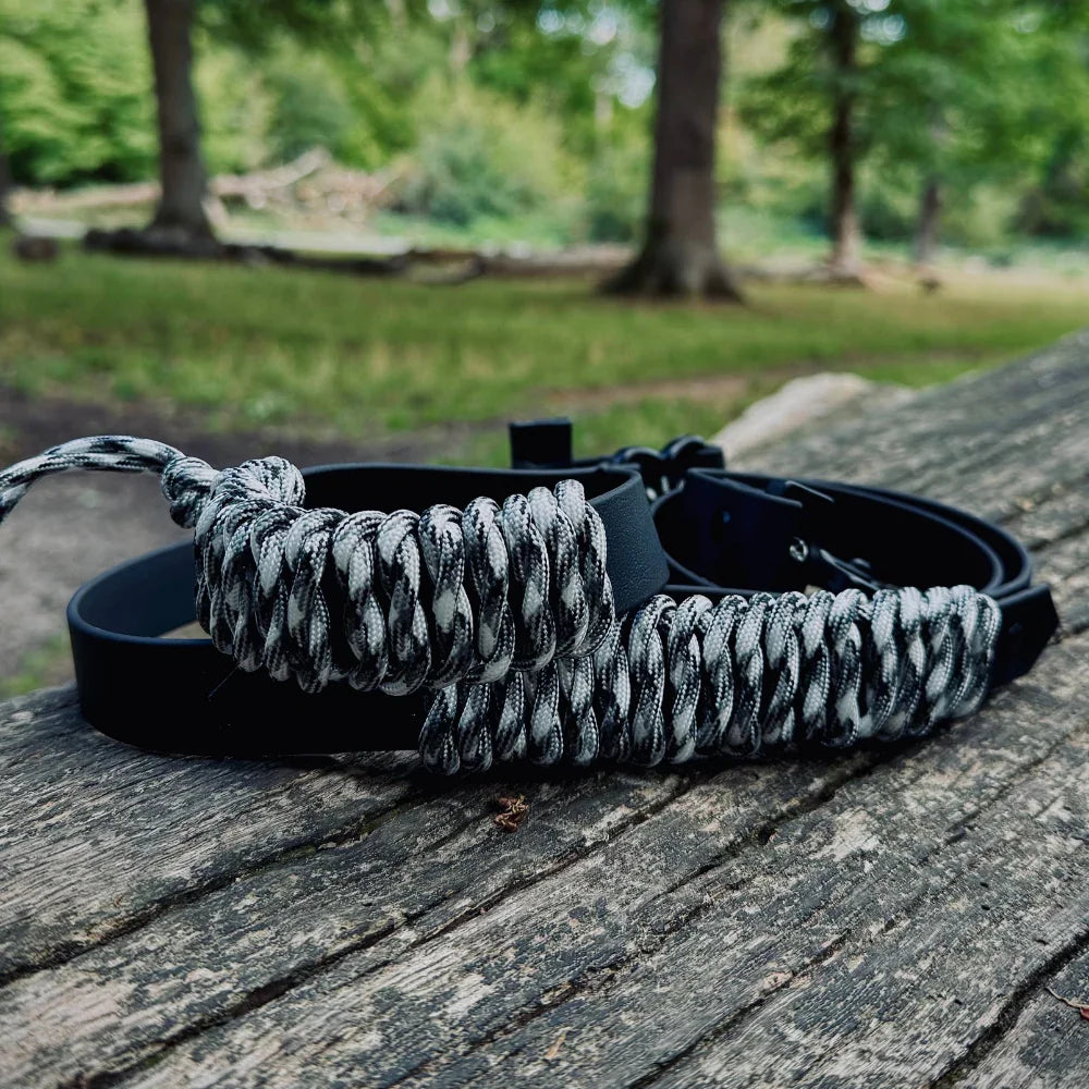 Handmade premium rPET rope and Biothane dog lead and collar on a wooden log outdoors