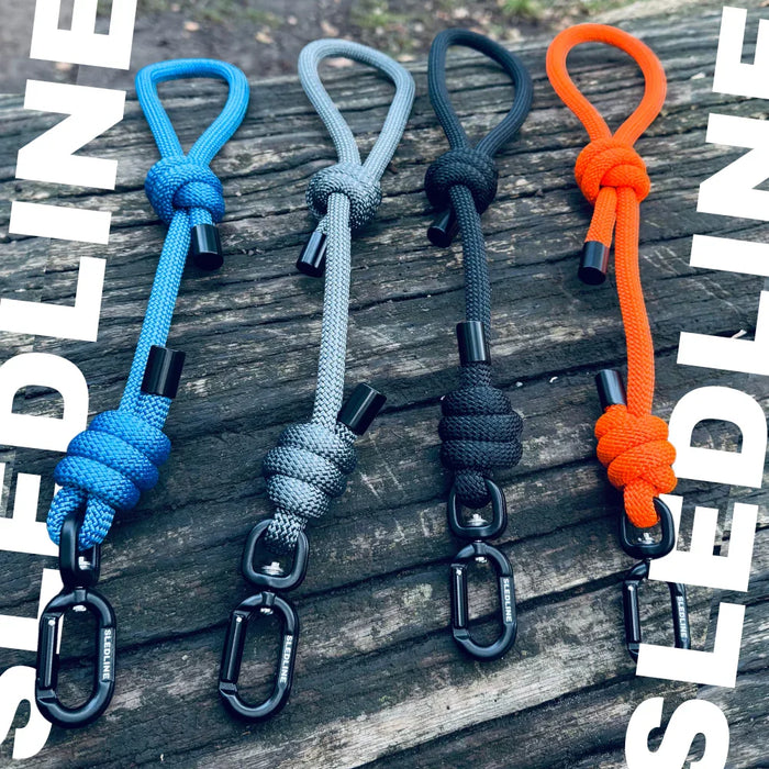 rPET rope dog lead attachments in blue, grey, black, and orange on wooden surface